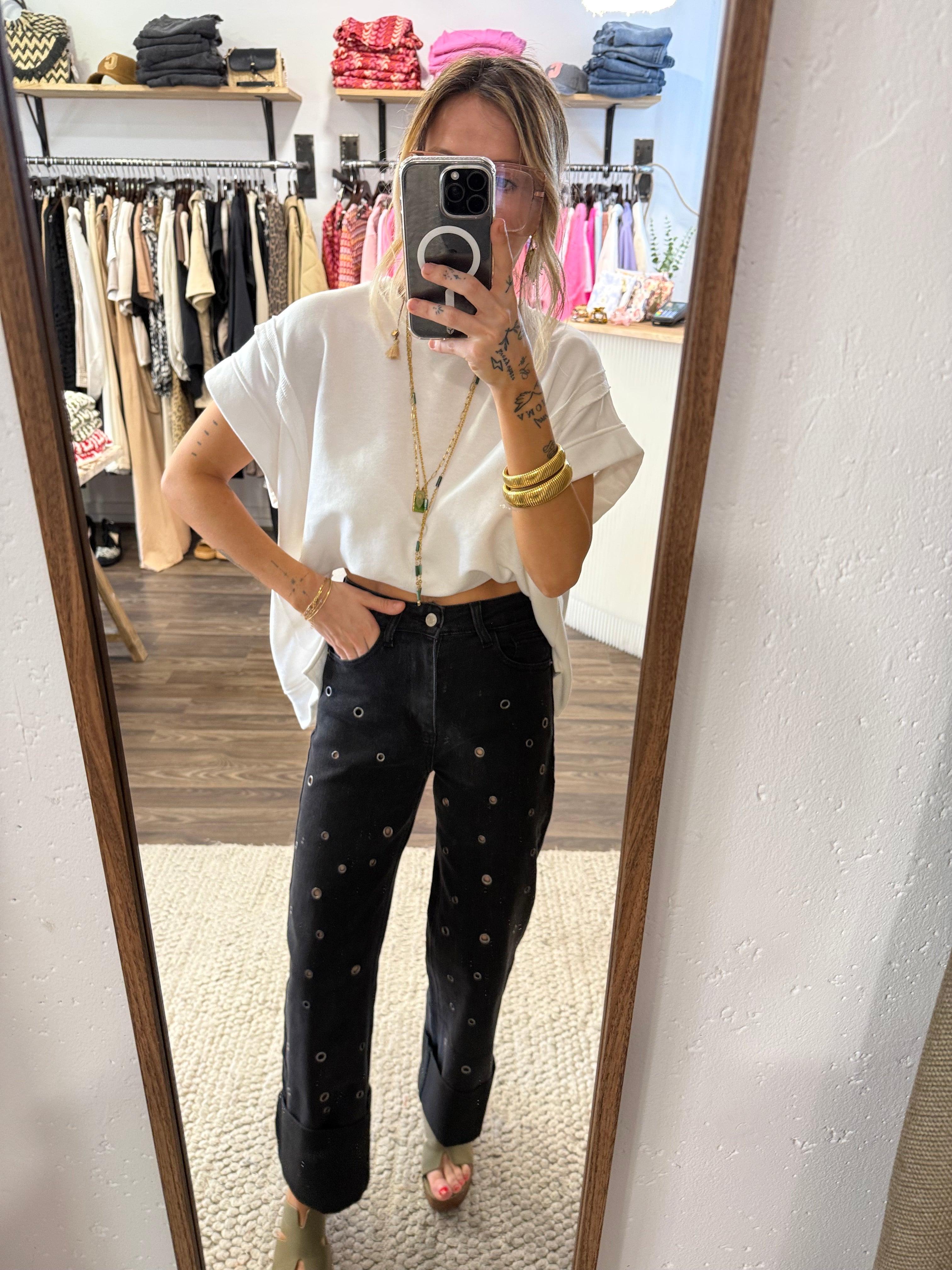 Jeans à oeillets - noir brut