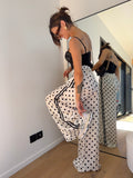 Pantalon en soie fluide à pois - beige